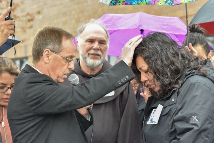 Larger-size-AB-Thompson-praying-over-Ericka-faith-in-indy