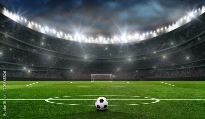 fussballfeld-mit-fussballtor-stockpack-adobe-stock fußballfeld mit fussballtor