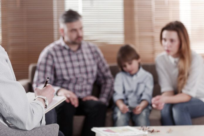 Hope-Therapy-Center-Advantages-of-Family-Therapy-banner-family-talking-with-therapist