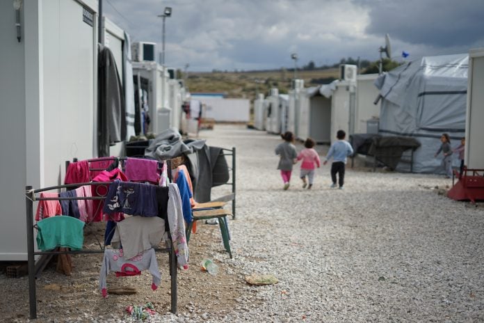 syrian-refugee-camp-in-the-outskirts-of-athens-over-66-million-syrians-were-forced-to-flee-their-home-since-2011-many-are-still-stranded-in-refugee-camps-in-turkey-and-greece-waiting-and-hoping-to-be--stockpack-unsplash Syrian refugee camp in the outskirts of Athens. Over 6.6 million Syrians were forced to flee their home since 2011. Many are still stranded in refugee camps in Turkey and Greece, waiting (and hoping) to be granted asylum in European countries or beyond. According to the United Nations Universal Declaration of Human Rights of 1948,